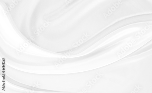 White gray satin texture that is white silver fabric silk background with beautiful soft blur pattern natural.