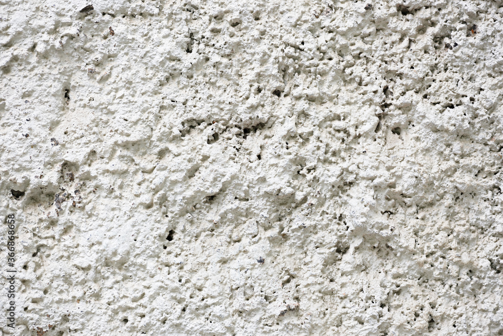 Background. Fragment of an old plastered wall close-up. Background. Fragment of an old plastered wall close-up.