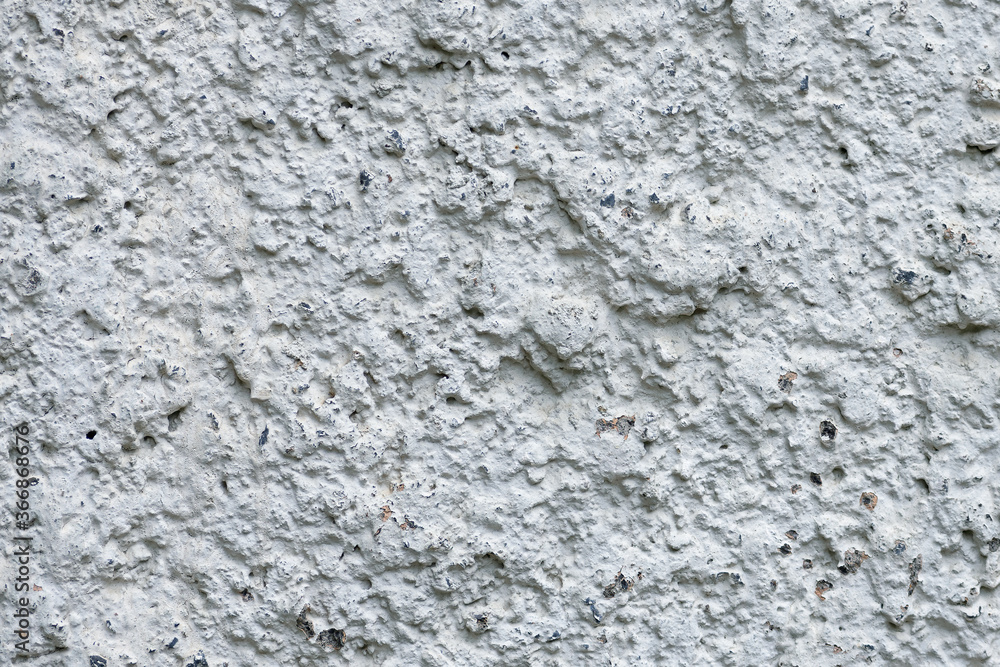 Background. Fragment of an old plastered wall close-up. Background. Fragment of an old plastered wall close-up.
