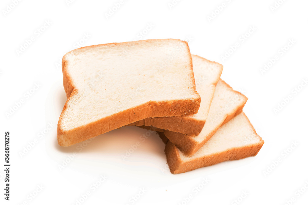 milk bread on white background, homemade slide bread on the wooden broad, Sliced bread isolated on a white background. Bread slices and crumbs viewed from above. Top view