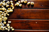 Directly above shot of popcorns on wooden background
