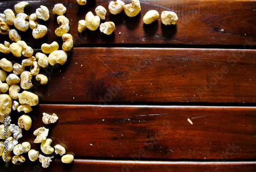 Directly above shot of popcorns on wooden background