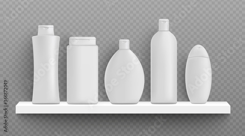 Realistic shampoo bottle mockup set on bathroom shelf