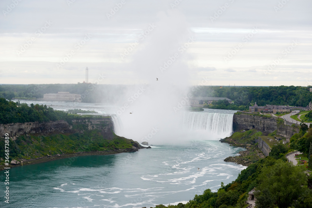 Toronto, August 15: close-up of a beautiful horseshoe fall with a ship nearby on August 15, 2014 in Toronto, Canada Toronto, August 15: close-up of a beautiful horseshoe fall with a ship nearby on August 15, 2014 in Toronto, Canada