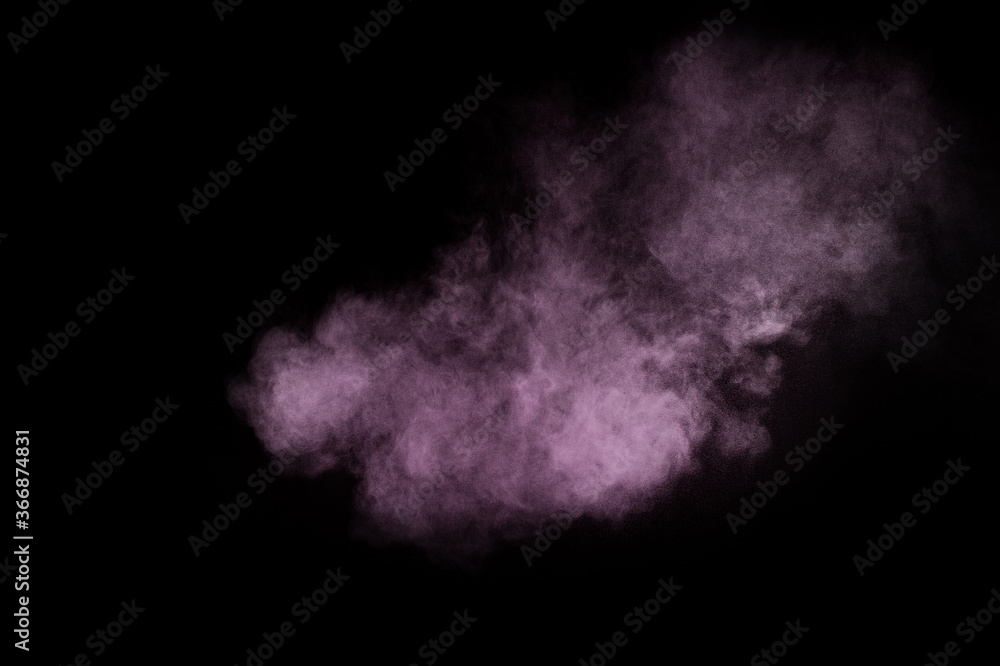 Purple powder explosion on black background. Colored powder cloud. Colorful dust explode. Paint Holi. Purple powder explosion on black background. Colored powder cloud. Colorful dust explode. Paint Holi.