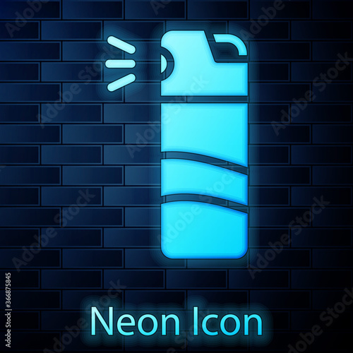 Glowing neon Pepper spray icon isolated on brick wall background. OC gas. Capsicum self defense aerosol. Vector.