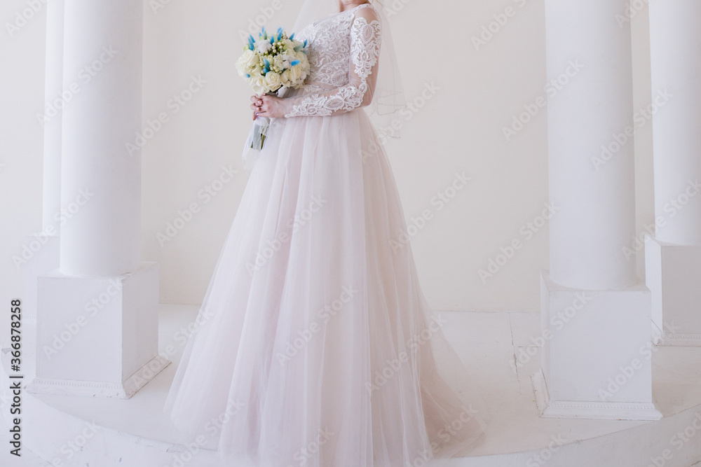 bride holding wedding bouquet in studio bride holding wedding bouquet in studio