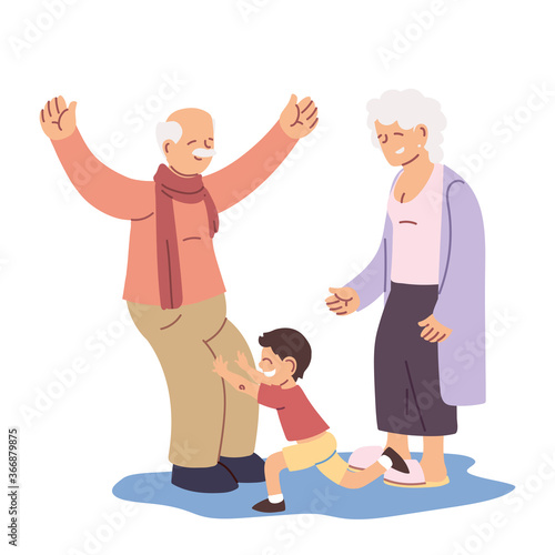 grandparents and grandson together smiling