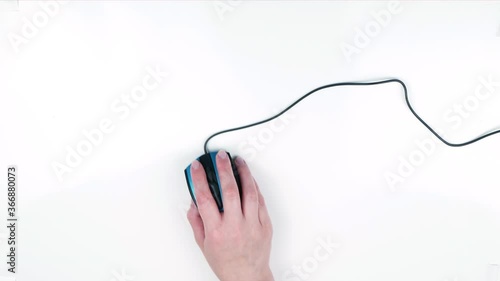 Top view of hand with computer mouse.
