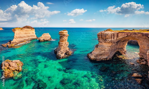 Exciting spring view of popular tourist attraction - Torre Sant'Andrea. Fabulous morning seascape of Adriatic sea, Torre Sant'Andrea village location, Apulia region, Italy, Europe.