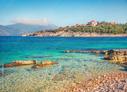 Calm spring scene of empty Emblisi beach. Amazing view of Kefalovia island, Greece, Europe. Picturesque morning seascape of Ionian Sea. Traveling concept background.