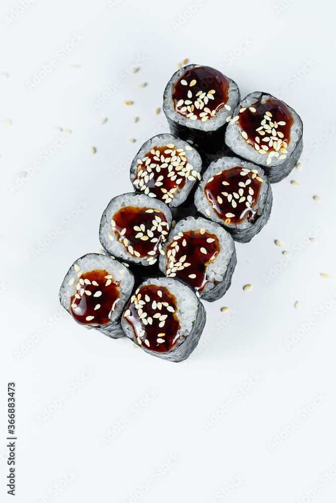 Japanese traditional food. Sushi rolls with fresh tuna avocado and cream cheese and soy sauce Japanese traditional food. Sushi rolls with fresh tuna avocado and cream cheese and soy sauce