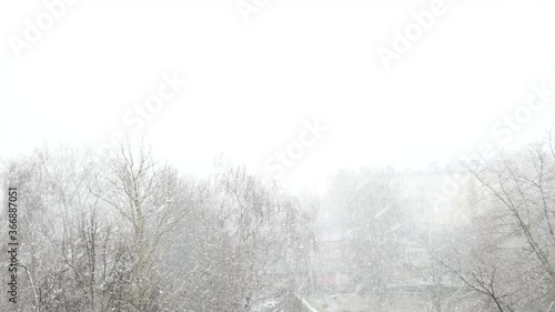Strong wind and snow in the town.