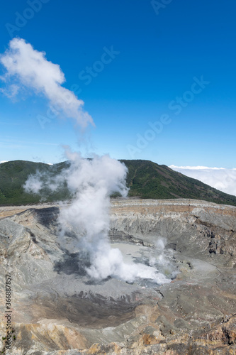 Costa Rica's Poas Volcano is blowing white smoke.