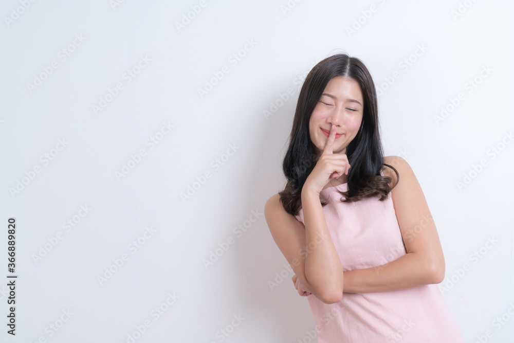 Young asian woman happy smiling in pink dress Young asian woman happy smiling in pink dress