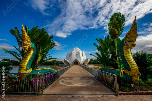 Phuttha Utthayan Wat Pa Dong Rai-Udon Thani:June 19,2020, the atmosphere inside a religious tourist site(Santi Wanaram Temple),a large lotus flower in the middle of the pool and a history in thailand. photo