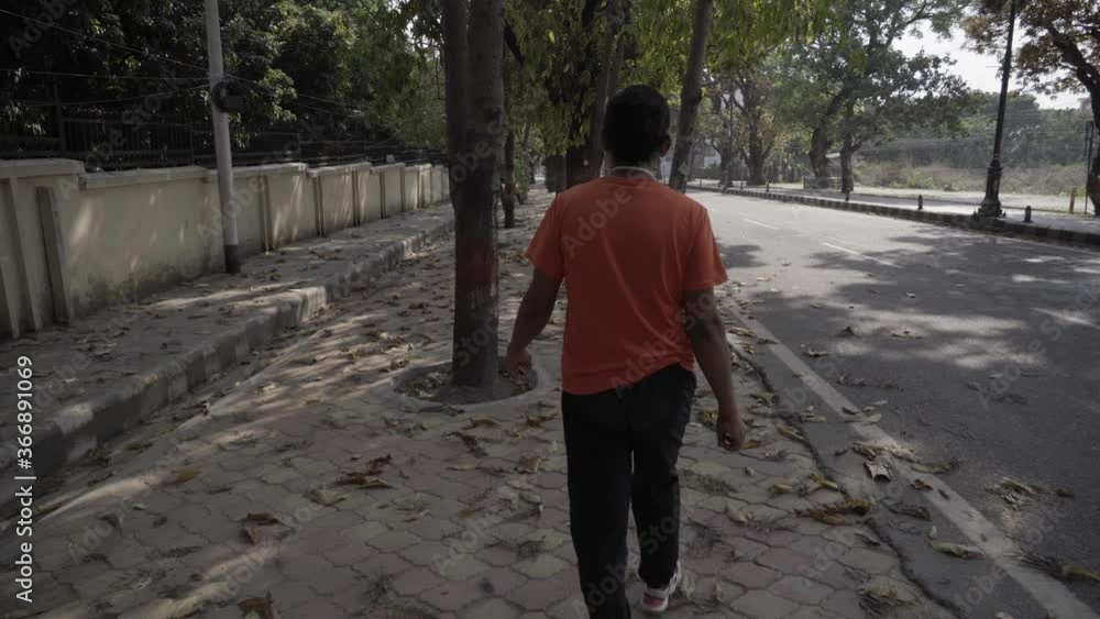 Coronavirus Lockdown in India. Man lonely walking in empty roads, river beaches (COVID-19). Atomos ninja 10 bit 4k Coronavirus Lockdown in India. Man lonely walking in empty roads, river beaches (COVID-19). Atomos ninja 10 bit 4k