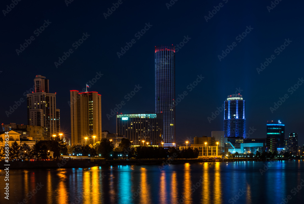 night city-Yekaterinburg and lights reflected in the Bay