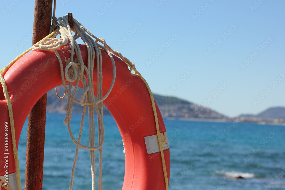 Fototapeta premium Alanya, TURKEY - August 10, 2013: Travel to Turkey. Clear blue sky. The waves of the Mediterranean Sea. Water surface. Coast.