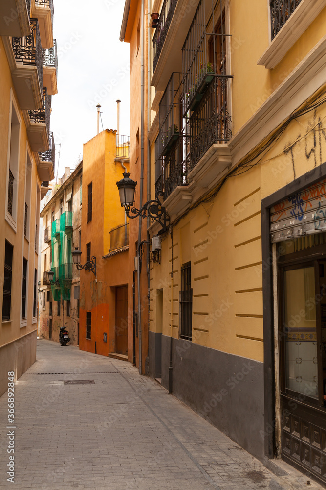 Picturesque old town streets in the city center of Valencia, Spain.