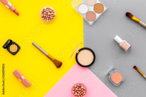 Multicolor pattern of makeup products and colorfull cosmetics. Flat lay top view