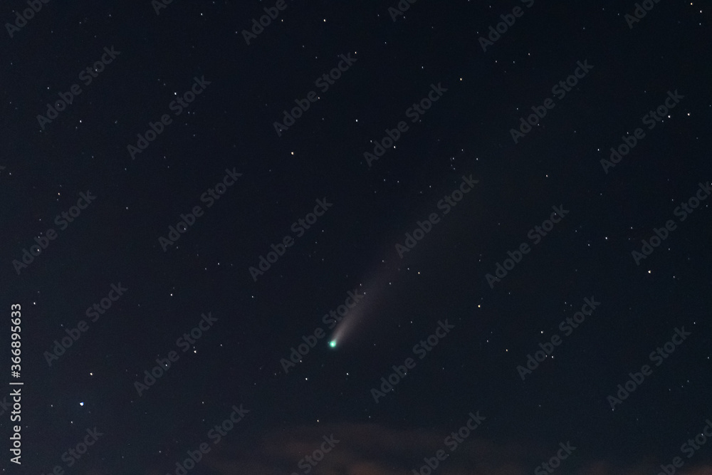 Neowise Comet ( C/2020 F3 )in cloudy  night sky at 22 July , grain image