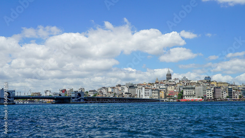 Fototapeta Naklejka Na Ścianę i Meble -  Golden Horn against mosques, Istanbul, Turkey. Panorama of Istanbul waterfront in summer. Beautiful view of an old part of Istanbul city. Vacation and traveling in Istanbul.