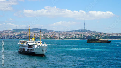 Golden Horn against mosques, Istanbul, Turkey. Panorama of Istanbul waterfront in summer. Beautiful view of an old part of Istanbul city. Vacation and traveling in Istanbul. © kubilayaltug