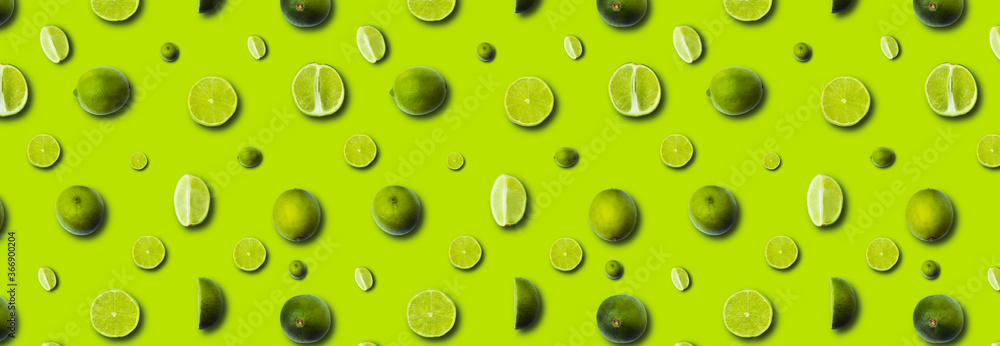 fresh slices lime on a light green background