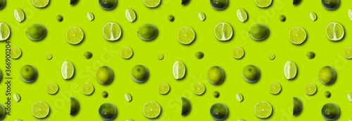fresh slices lime on a light green background