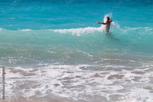 A man swimming in the sea
