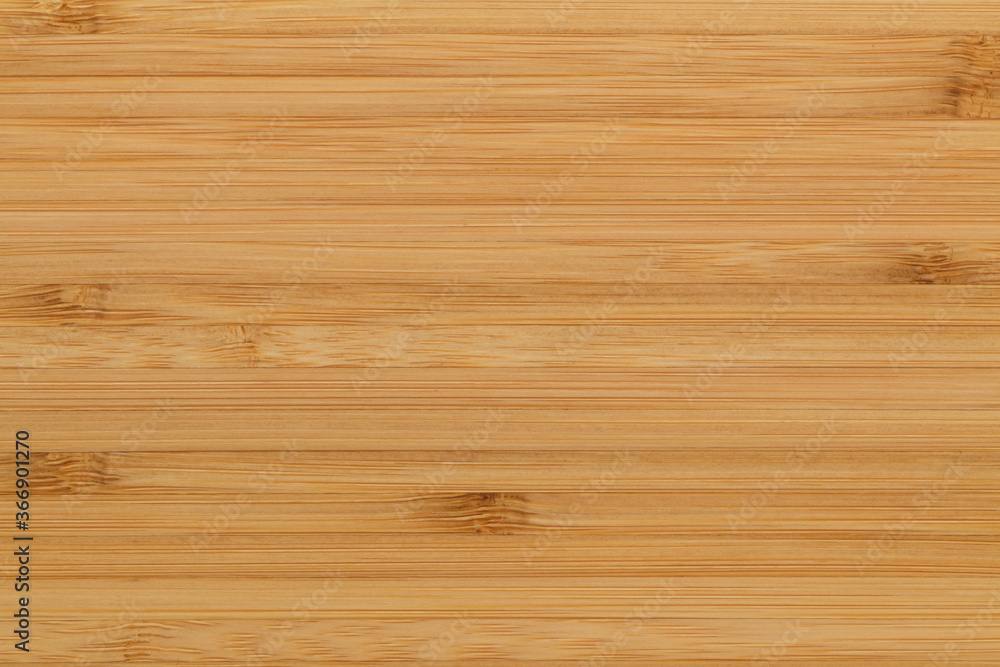 Smooth bamboo wood background board in a horizontal pattern. Smooth bamboo wood background board in a horizontal pattern.