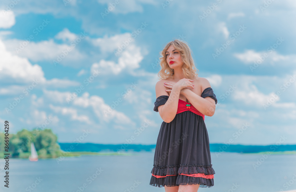 Pretty vintgae style for ladies, retro polka dot dress. Plus size L-Xl size woman at nature, fancy style Pretty vintgae style for ladies, retro polka dot dress. Plus size L-Xl size woman at nature, fancy style