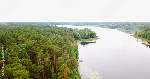 Lake in forest nature reserve photo