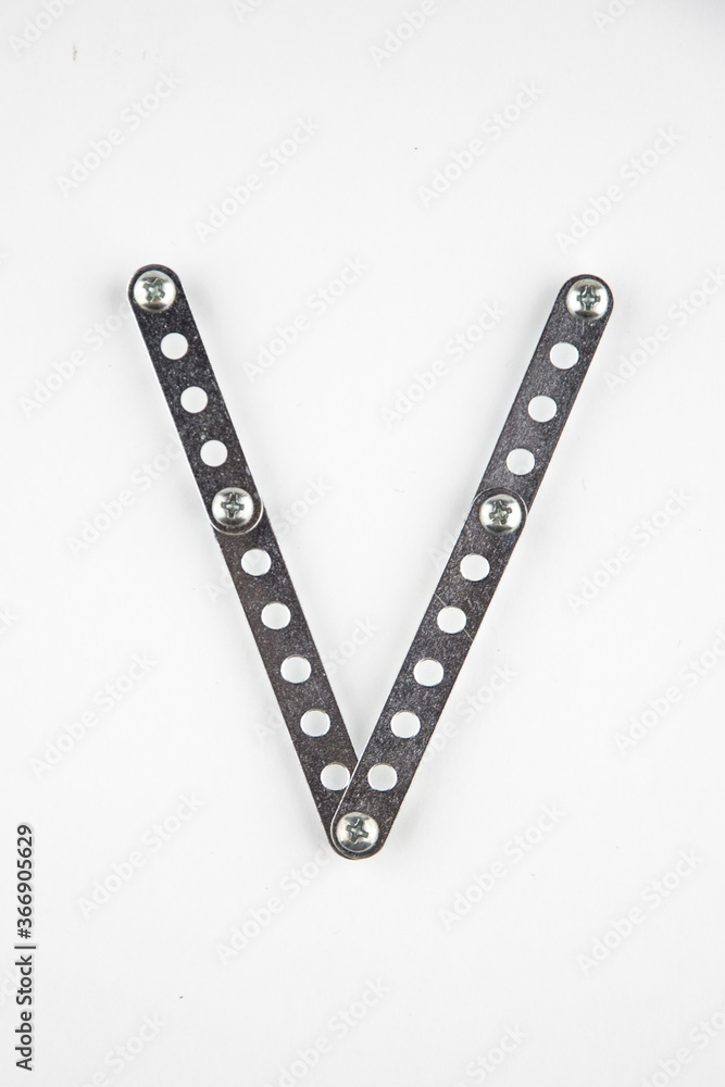 Letter V of English alphabet from Children's metal designer kit Letter V of English alphabet from Children's metal designer kit