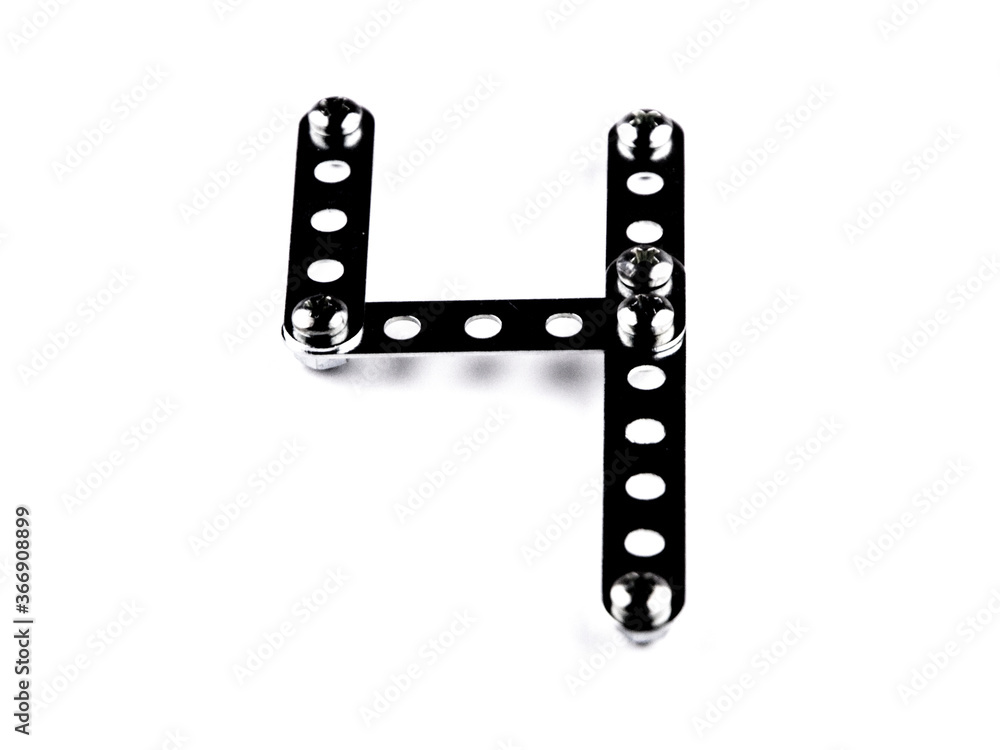 Math playing: Figure 4 is built with a children's designer, with the effect of black shiny steel, a slight slope. Isolated on white with shadows, front view Math playing: Figure 4 is built with a children's designer, with the effect of black shiny steel, a slight slope. Isolated on white with shadows, front view