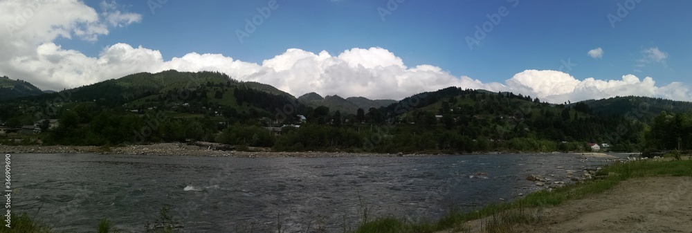 Fototapeta premium Carpathian mountains and mountain river on a summer day landscape panorama