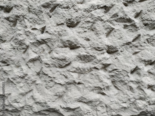 Cracked concrete texture close-up background. Volume texture of concrete