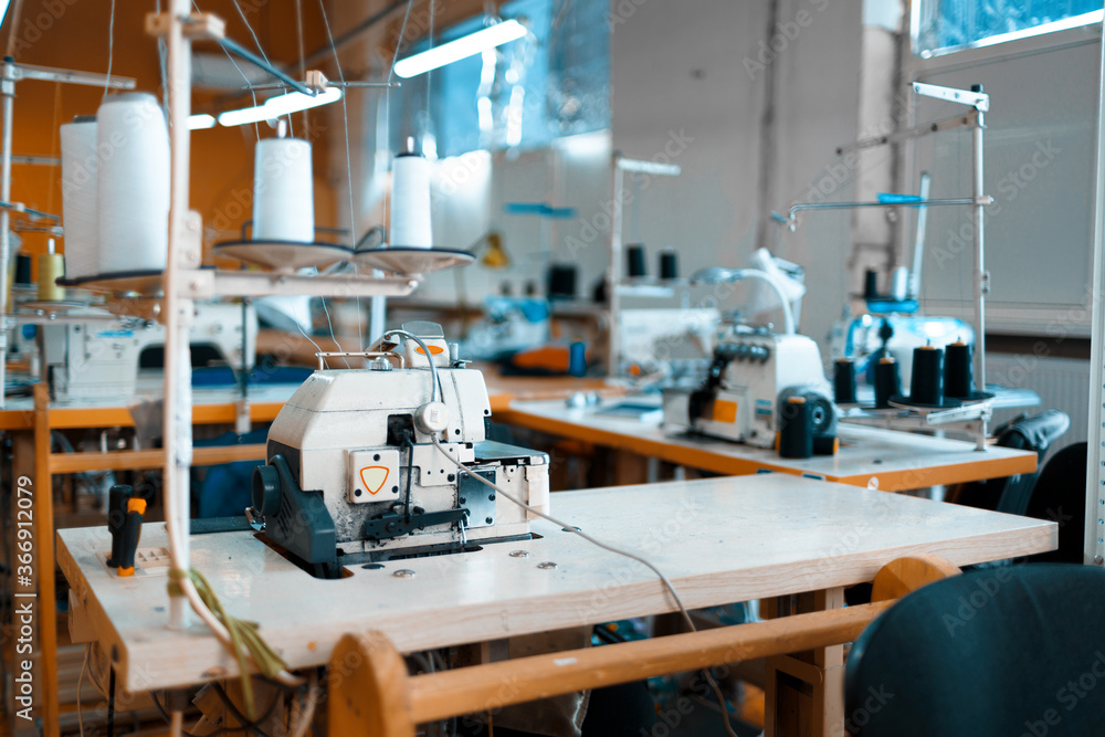 Sewing department of a textile factory interior Sewing department of a textile factory interior