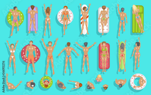 People swim on inflatable circles, inflatable mattresses, surfboards. Top view. Summer time. Men and women swim in the ocean, sea, river, lake, water. View from above.