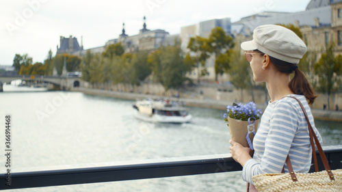 Photography Beautiful girl with flowers on the bridge
