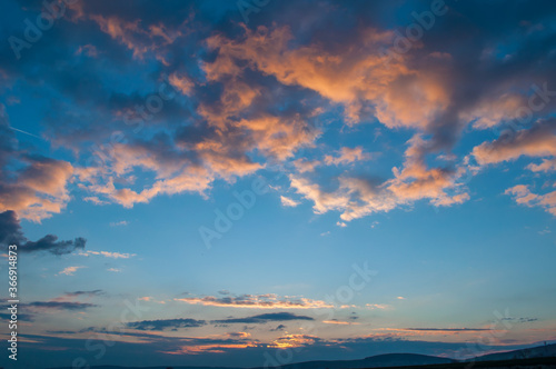 Wall Mural Sunset sky with clouds