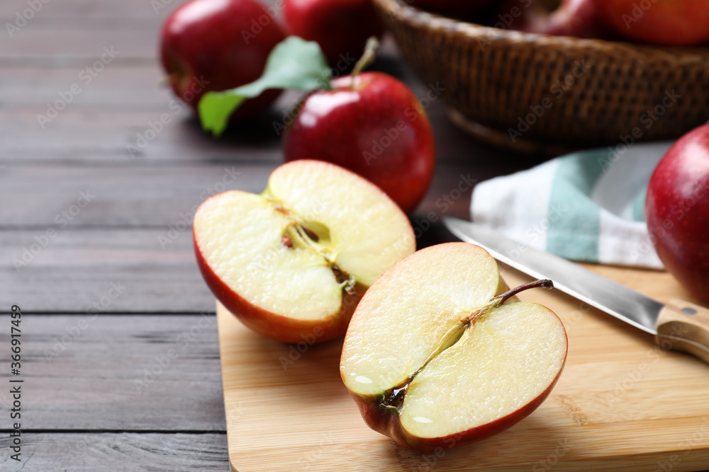 Composition with juicy red apples on wooden table, closeup Composition with juicy red apples on wooden table, closeup