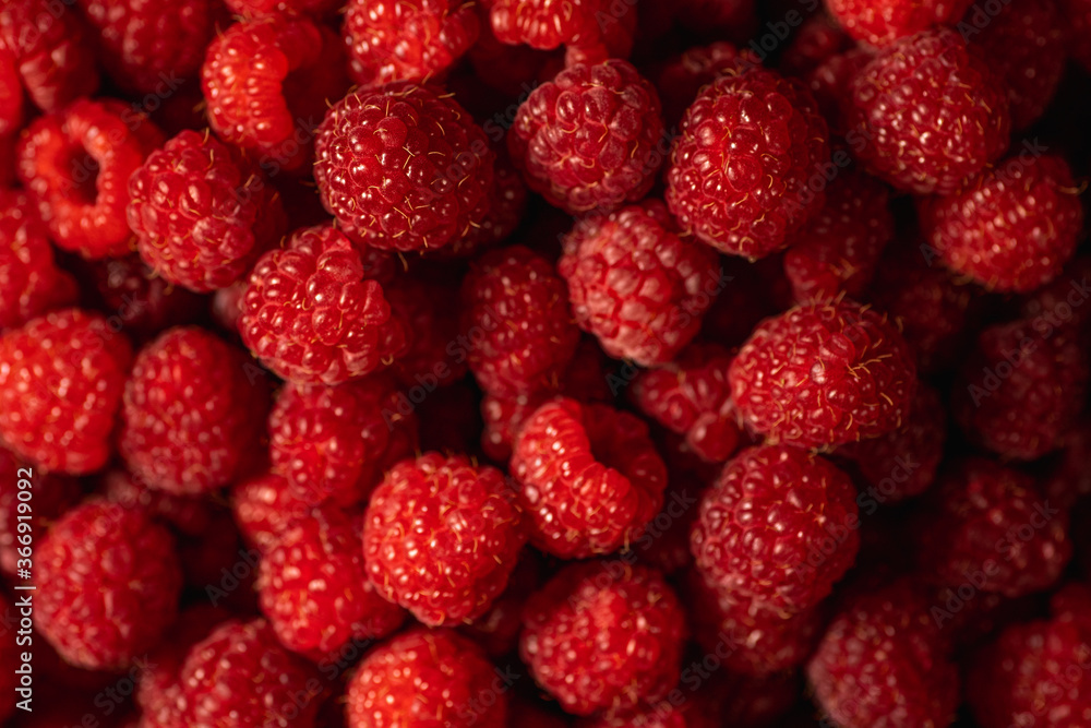Red Raspberry background, ripe fresh organic raspberries, macro shot close up. Red Raspberry background, ripe fresh organic raspberries, macro shot close up.