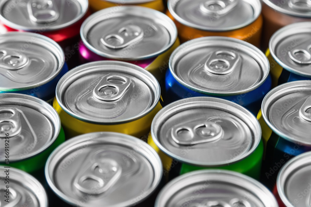 aluminum cans with carbonated water, energy drinks or beer. the view from the top aluminum cans with carbonated water, energy drinks or beer. the view from the top