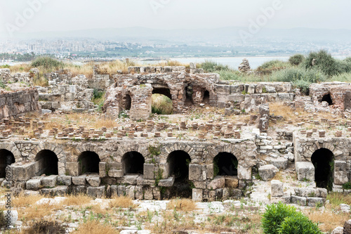 Roman bathhouse and columns in Al Mina archaeological site, Tyre, Lebanon photo