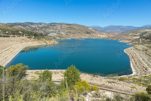 Beninar reservoir surrounded by mountains