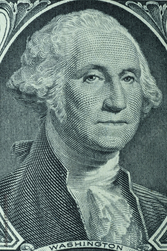 Portrait of George Washington, the first president of USA, printed on one dollar banknote photo