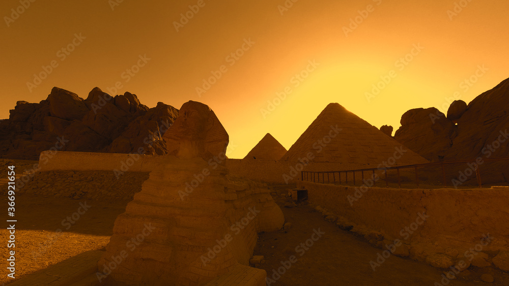 Egyptian pyramids and the Sphinx in the desert