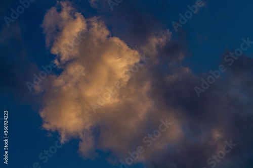 Close-up cumulus cloud. Sky. Natural background.